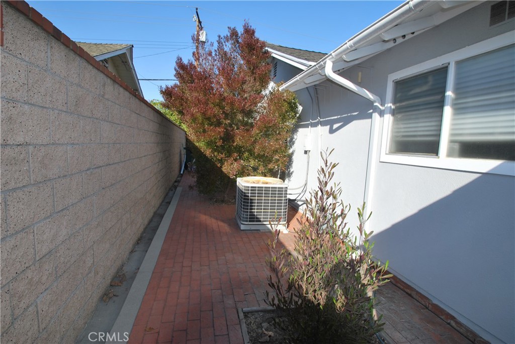 3001 Coleridge Drive Rossmoor, CA 90720 - Photo 21 of 25 a house with trees in front of it