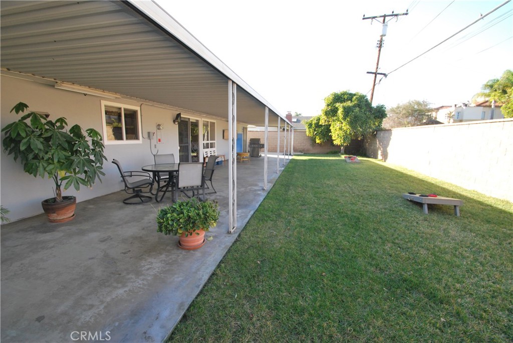 3001 Coleridge Drive Rossmoor, CA 90720 - Photo 23 of 25 a front view of a house with garden
