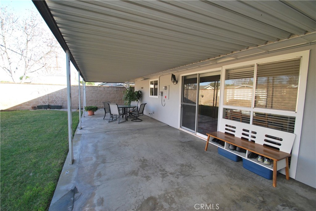 3001 Coleridge Drive Rossmoor, CA 90720 - Photo 25 of 25 a backyard of a house with table and chairs
