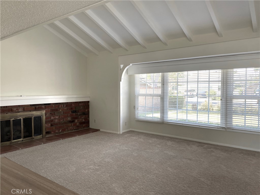 3001 Coleridge Drive Rossmoor, CA 90720 - Photo 8 of 25 a view of an empty room with a window
