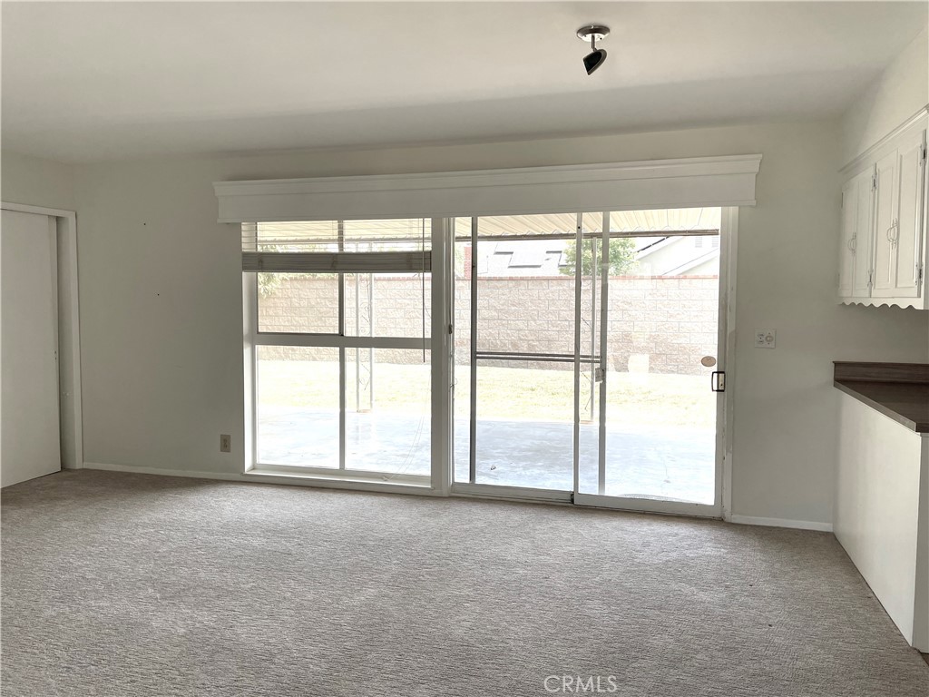 3001 Coleridge Drive Rossmoor, CA 90720 - Photo 9 of 25 a view of an empty room with a window