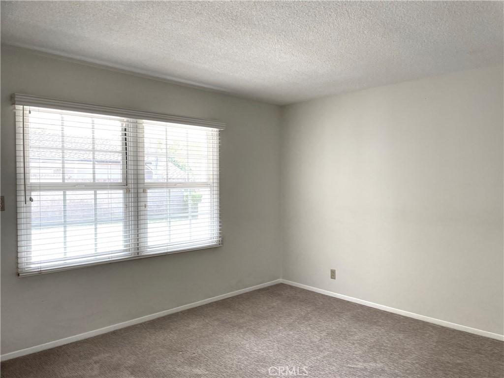 3001 Coleridge Drive Rossmoor, CA 90720 - Photo 10 of 25 an empty room with a window