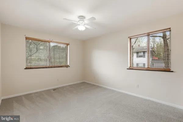 a workspace with furniture and window