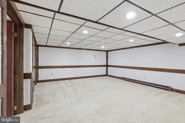 a workspace with furniture and window