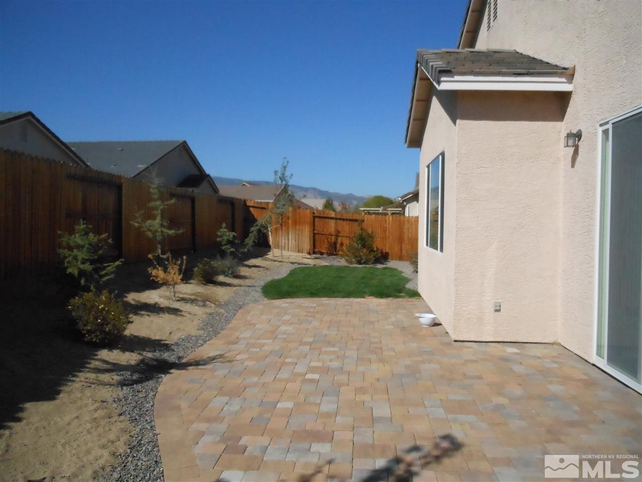 1624 Sewell Drive Reno, NV 89521 - Photo 10 of 14 a view of a house with yard and plants