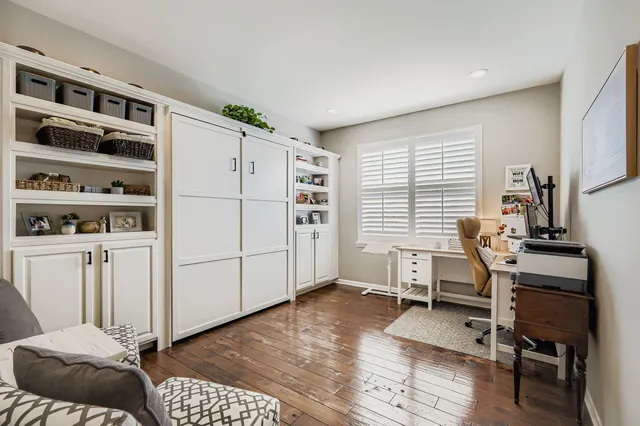 a view of a livingroom with furniture and window