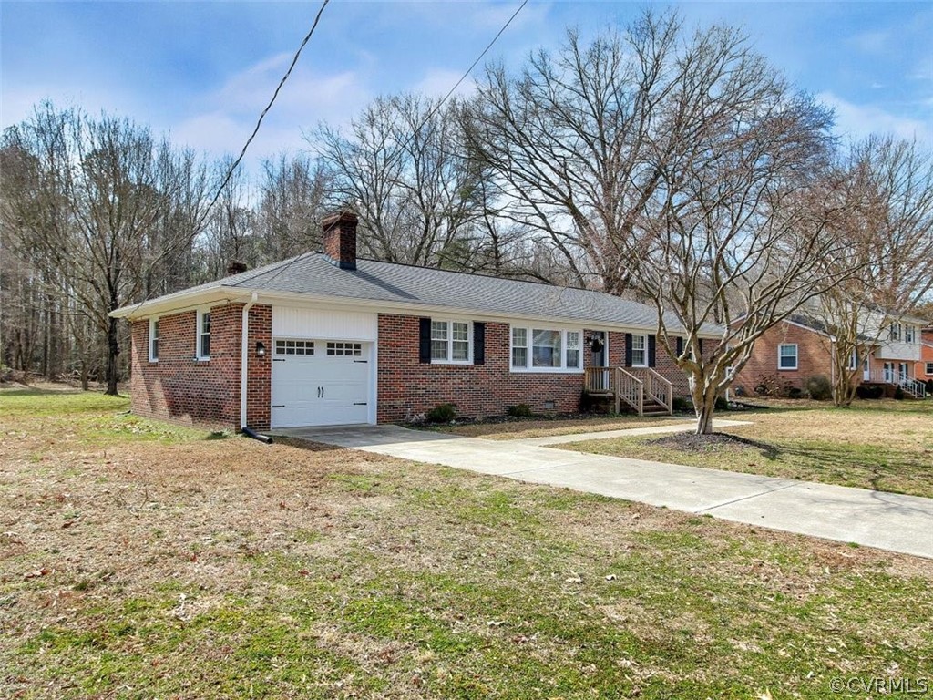 1315 Covington Road Colonial Heights, VA 23834 - Photo 24 of 24 a view of a house with a yard covered in snow