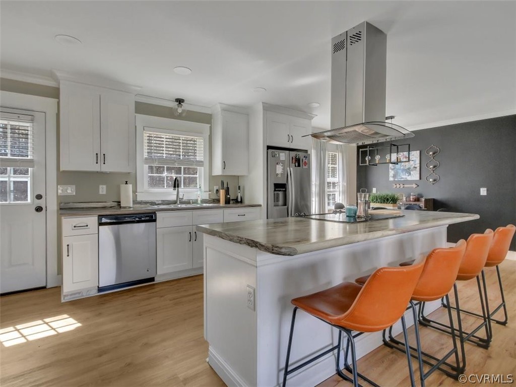1315 Covington Road Colonial Heights, VA 23834 - Photo 5 of 24 a kitchen with stainless steel appliances granite countertop a stove top oven a sink dishwasher and cabinets with wooden floor