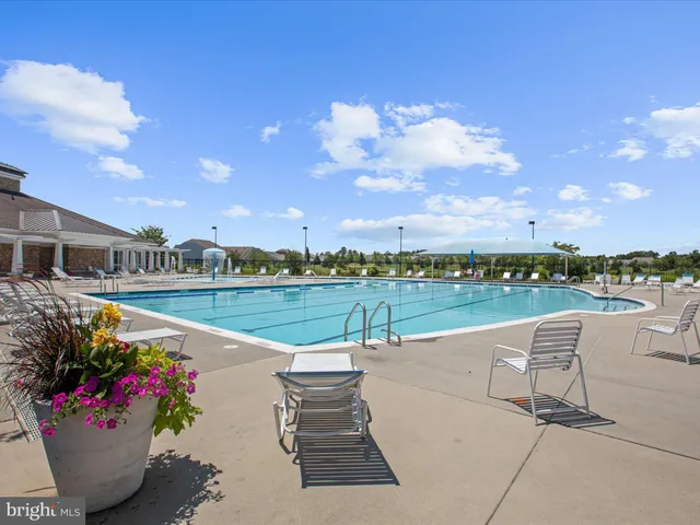 a view of a street with an ocean view