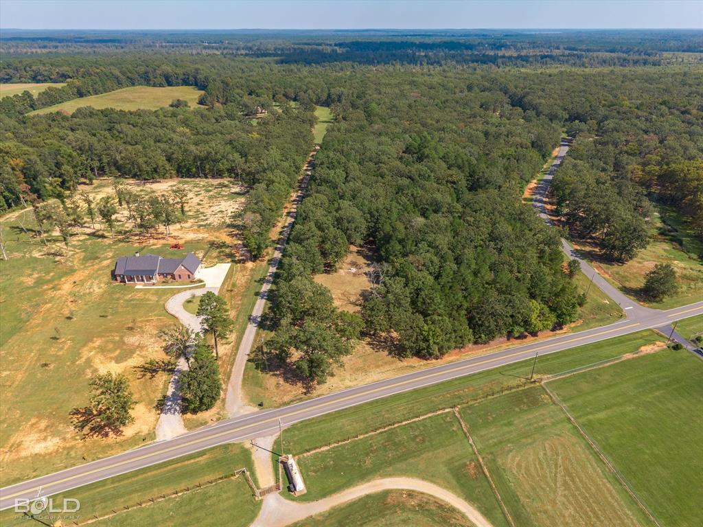 1228 Old Plain Dealing Road Benton, LA 71006 - Photo 2 of 11 an aerial view of residential houses with outdoor space