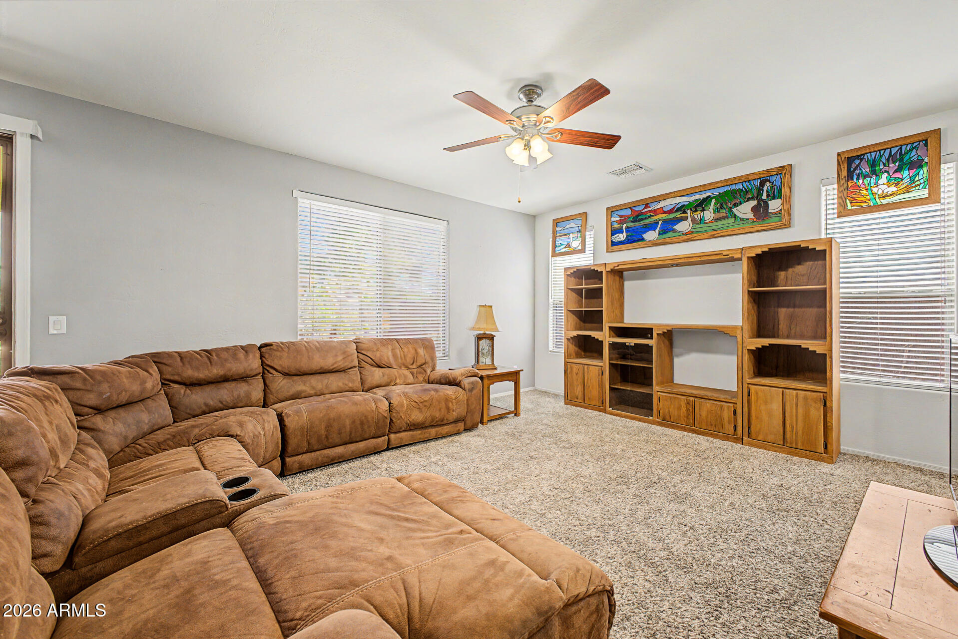 6622 West Harwell Road Laveen, AZ 85339 - Photo 8 of 32 a living room with furniture and a flat screen tv