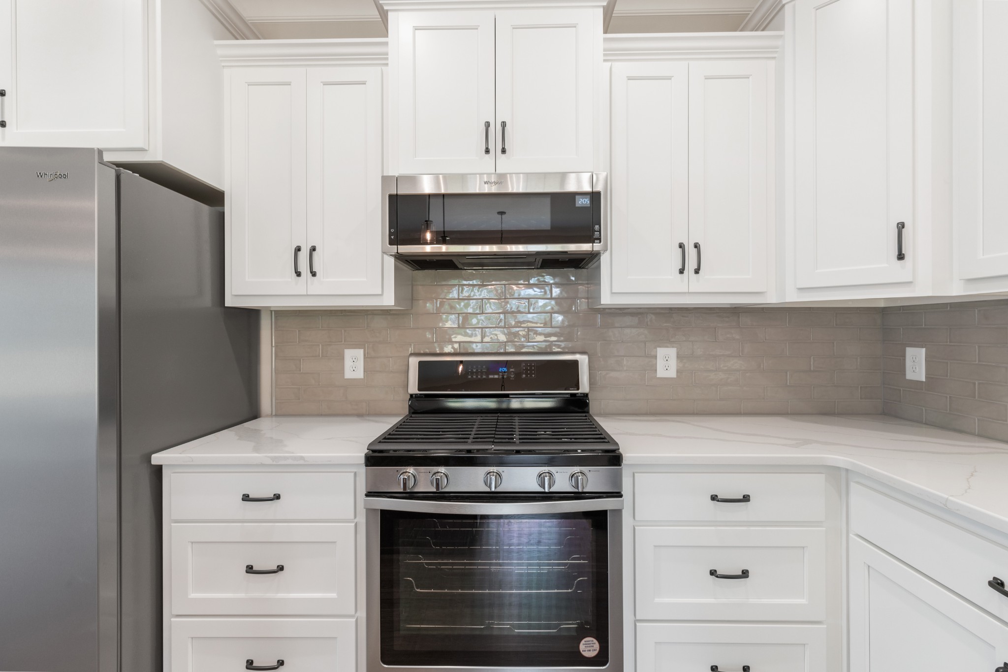 102 Mccreary Dickson, TN 37055 - Photo 11 of 31 a stove top oven sitting inside of a kitchen