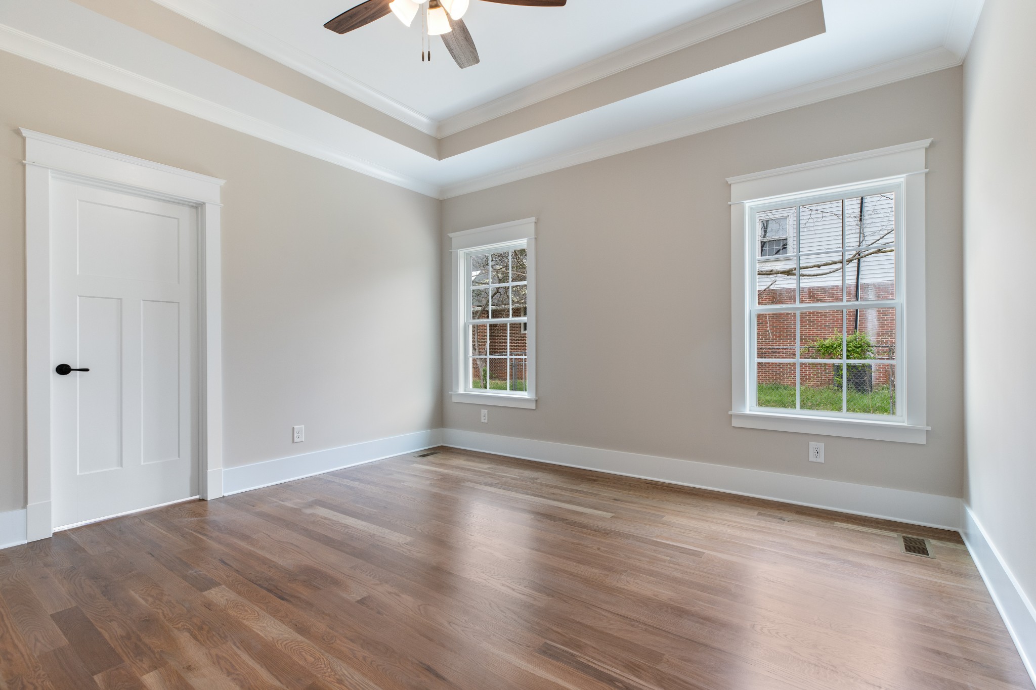 102 Mccreary Dickson, TN 37055 - Photo 15 of 31 an empty room with wooden floor cabinet and windows