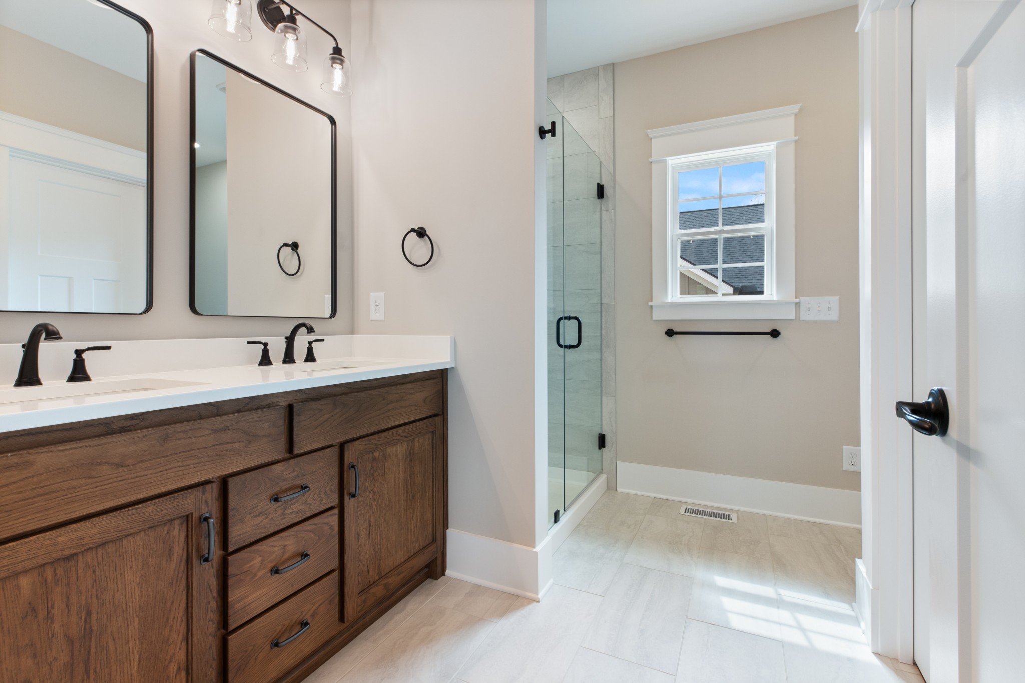 102 Mccreary Dickson, TN 37055 - Photo 17 of 31 a bath room with a sink double vanity and a mirror