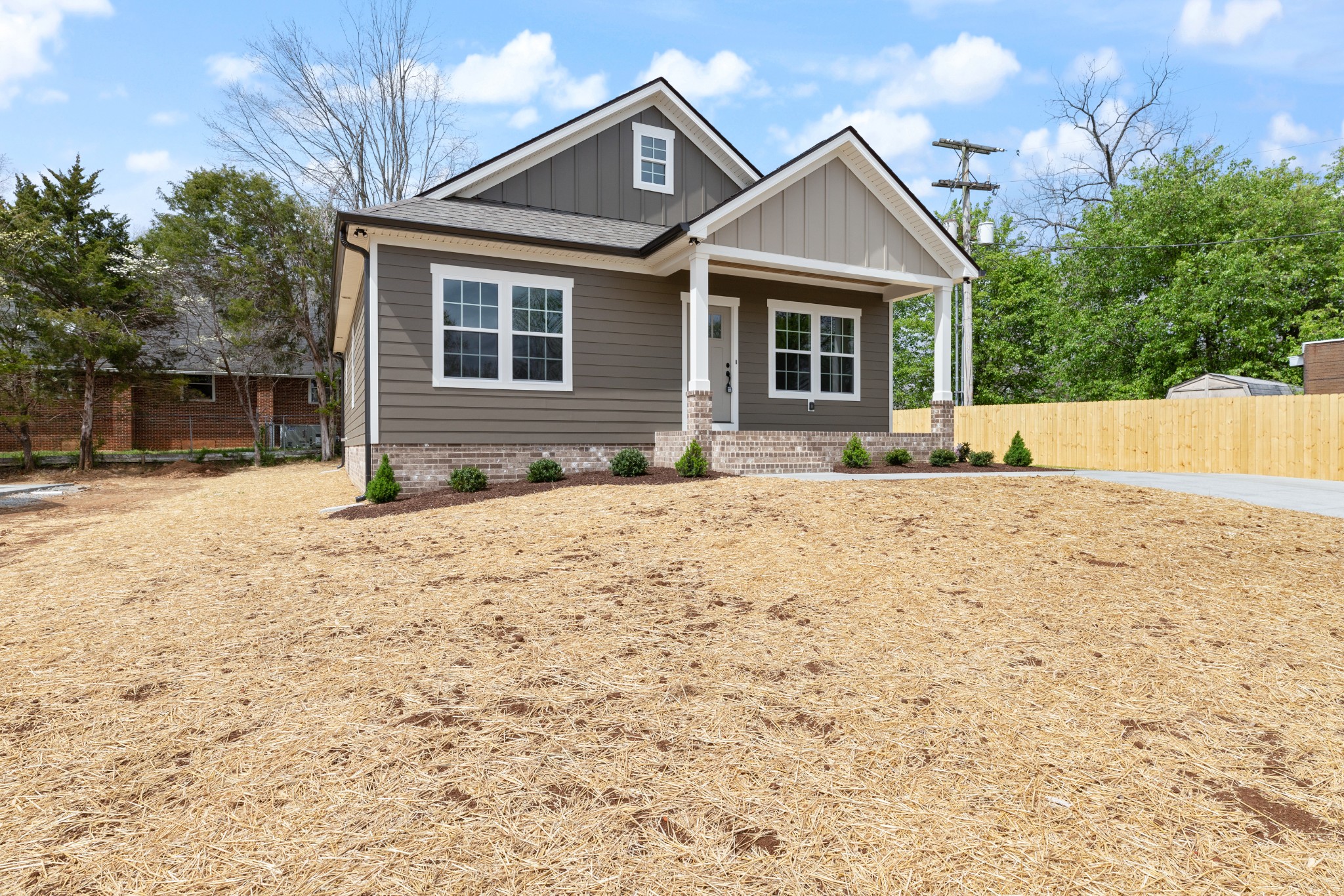 102 Mccreary Dickson, TN 37055 - Photo 2 of 31 a front view of a house with a yard and garage