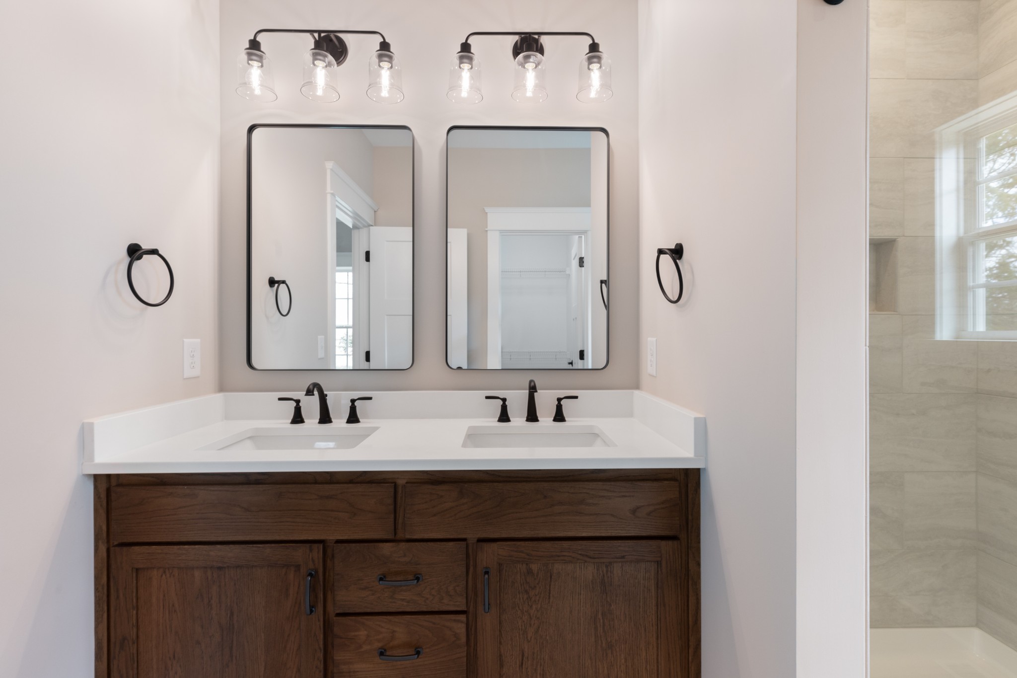 102 Mccreary Dickson, TN 37055 - Photo 21 of 31 a bathroom with a double vanity sink and a mirror