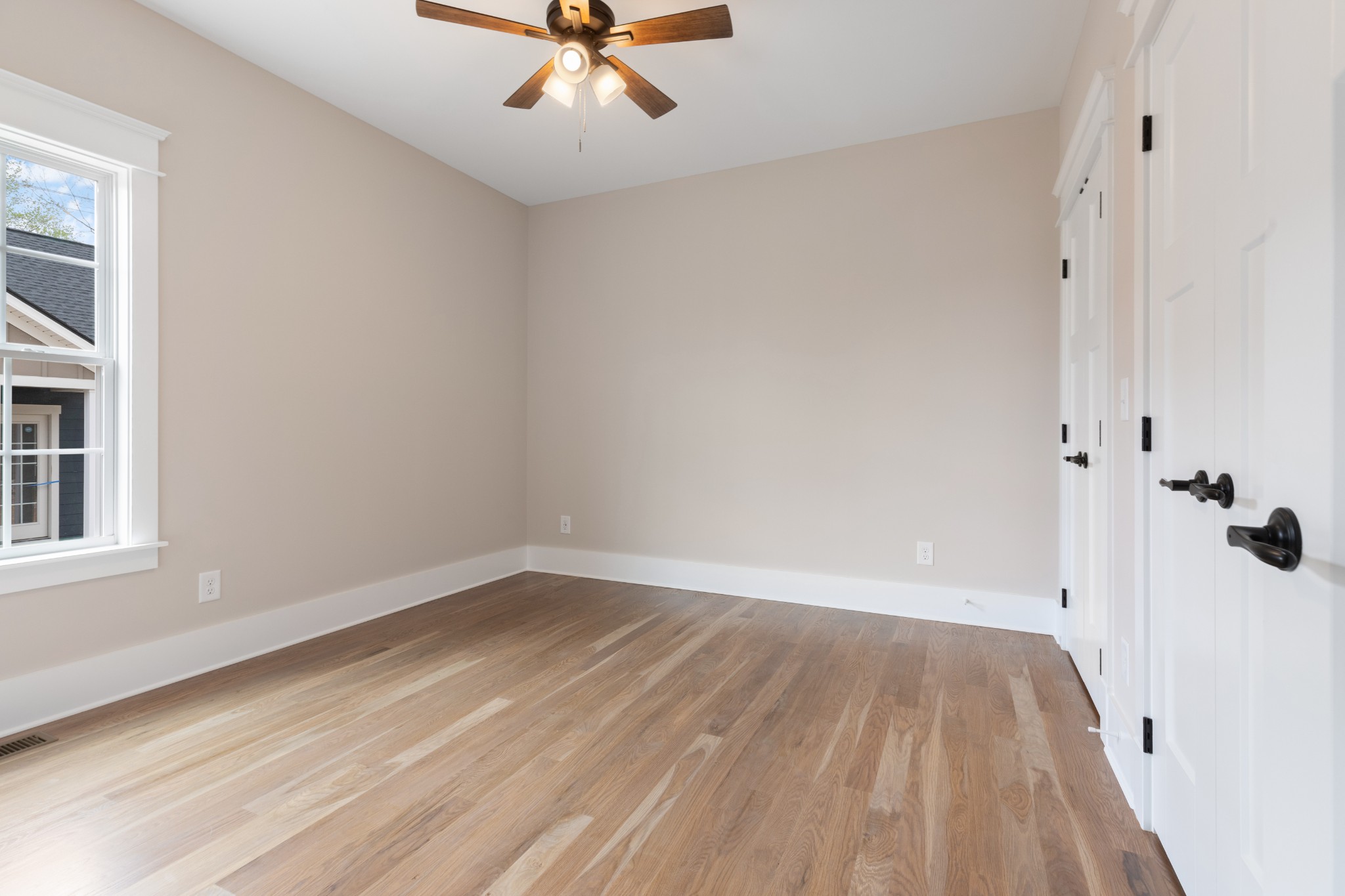102 Mccreary Dickson, TN 37055 - Photo 22 of 31 a view of a room with a wooden floor and white walls