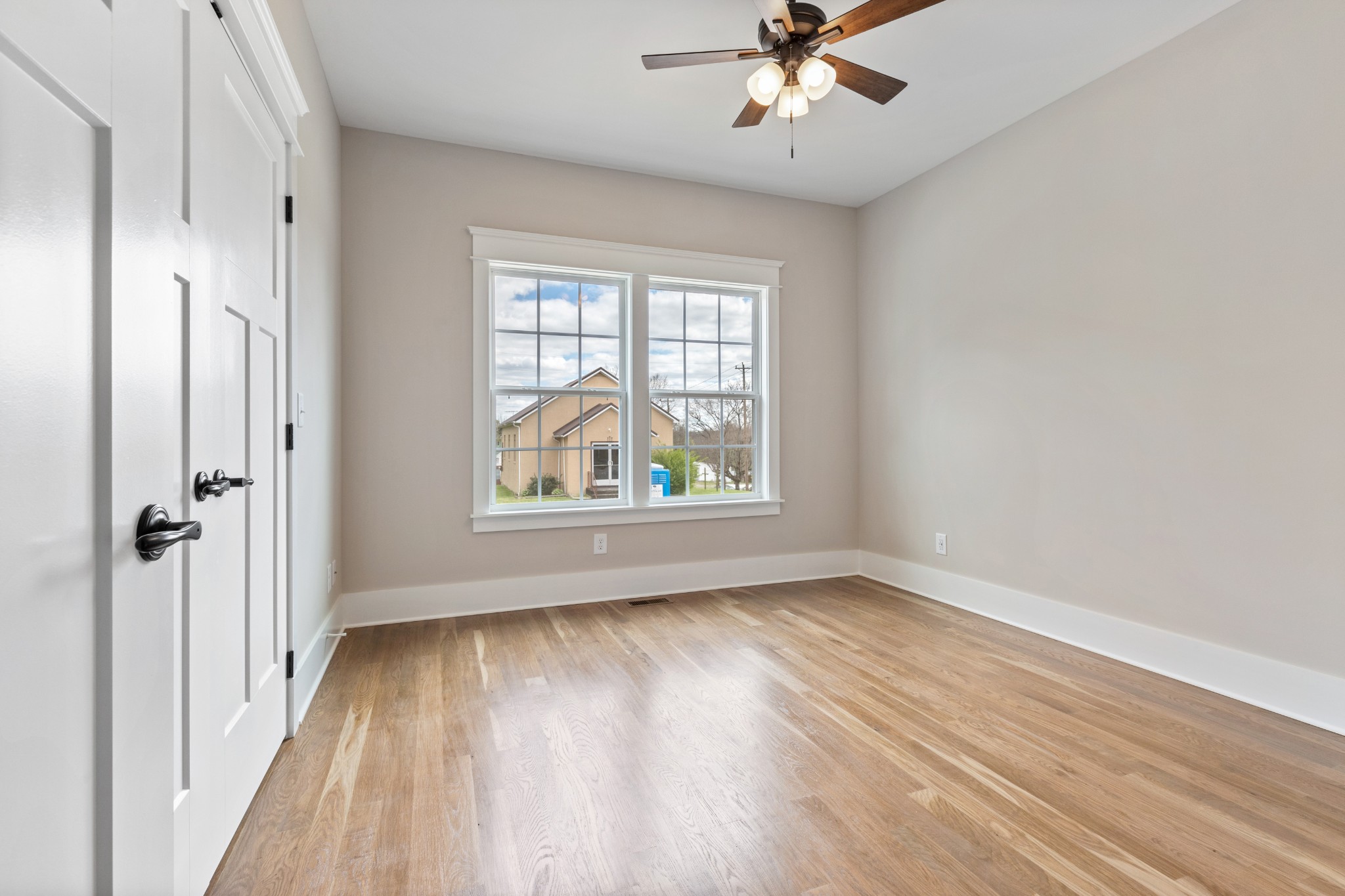 102 Mccreary Dickson, TN 37055 - Photo 24 of 31 wooden floor in an empty room with a window