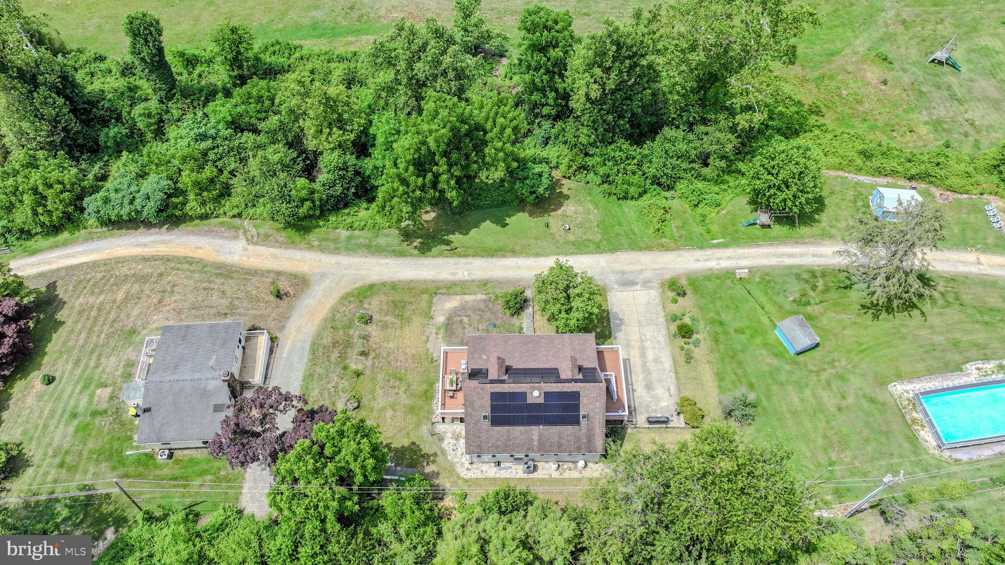 210 Elk View Road North East, MD 21901 - Photo 51 of 64 an aerial view of a swimming pool with a yard