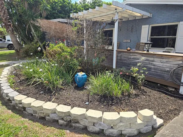 a view of a back yard of the house
