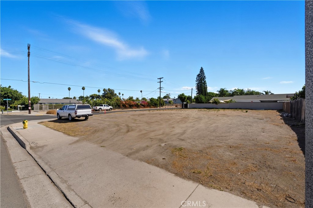 0 Cypress Avenue Riverside, CA 92503 - Photo 8 of 8 a cars parked on a sidewalk next to a road