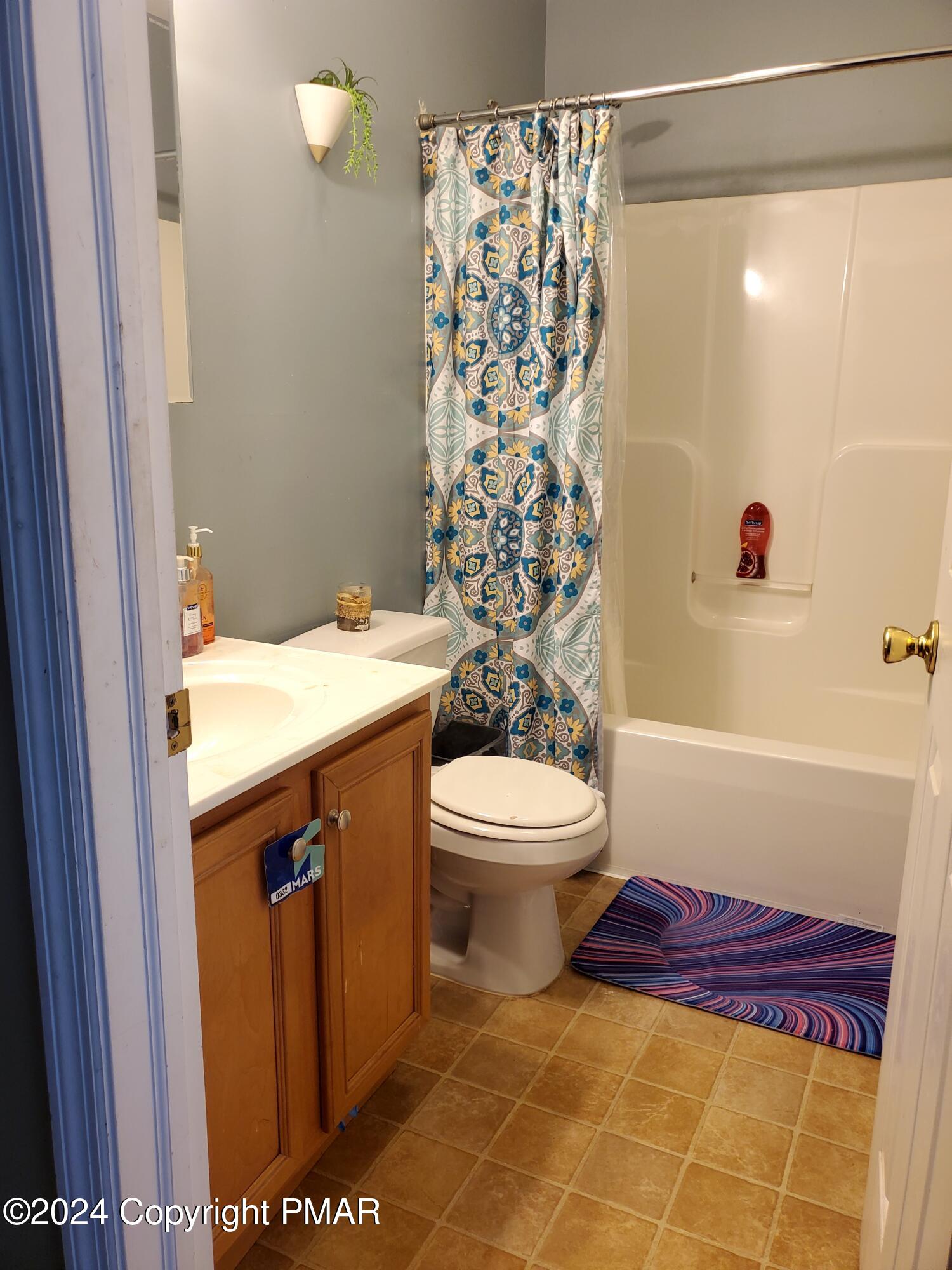 1102 Steele Circle Bushkill, PA 18324 - Photo 13 of 23 a bathroom with a sink a toilet and shower