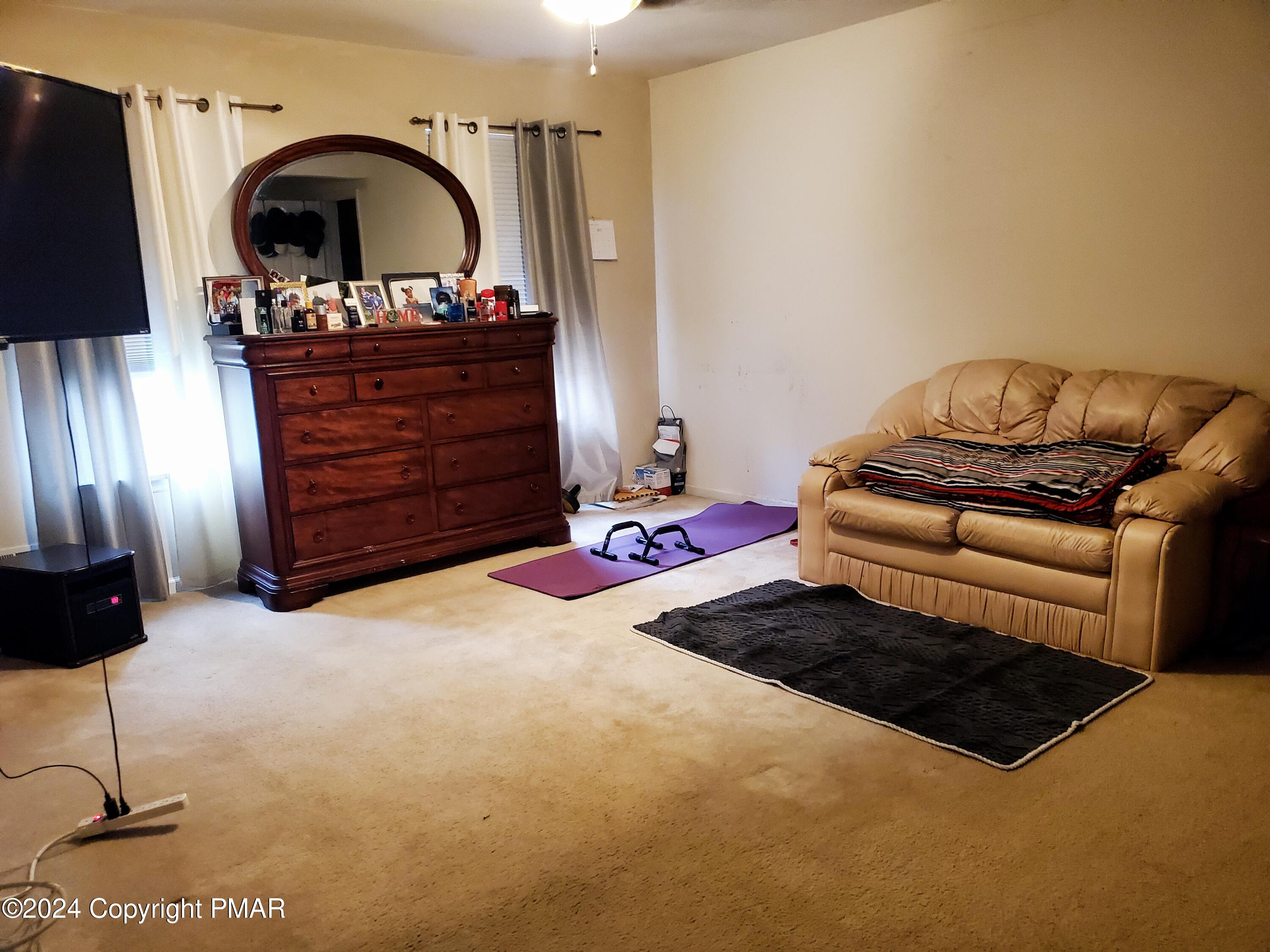 1102 Steele Circle Bushkill, PA 18324 - Photo 6 of 23 a living room with furniture