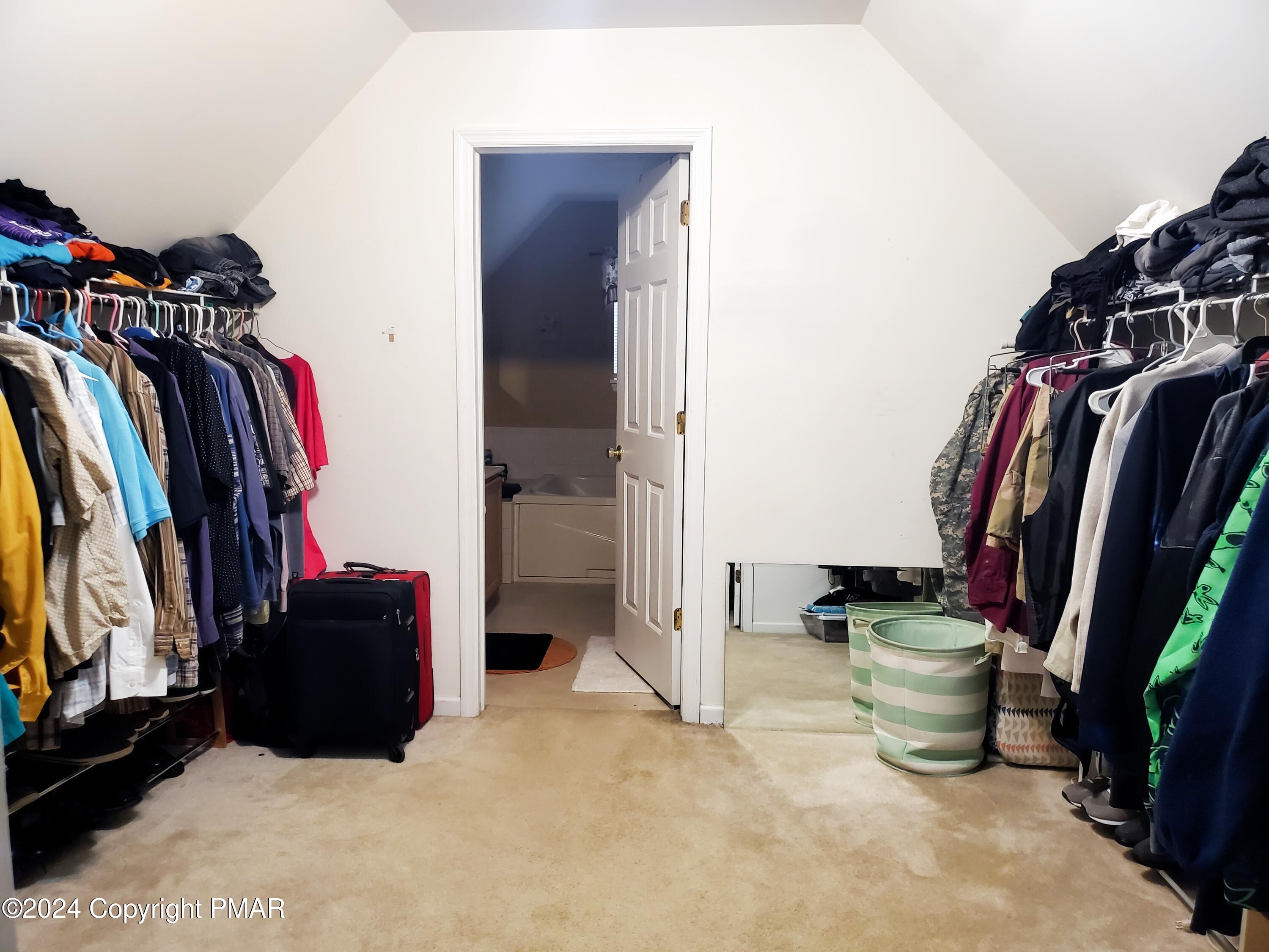 1102 Steele Circle Bushkill, PA 18324 - Photo 7 of 23 a view of walk in closet with clothes and shoes