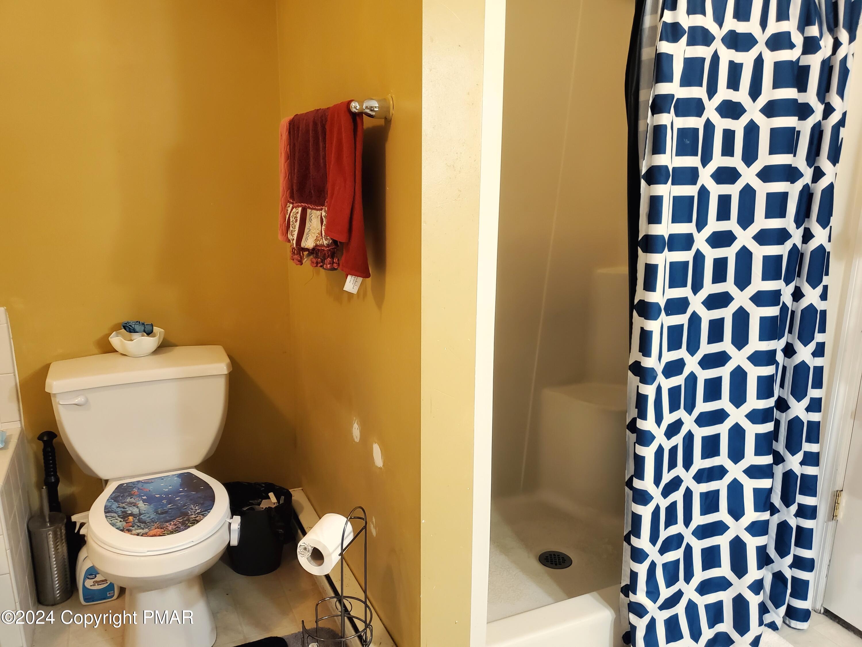 1102 Steele Circle Bushkill, PA 18324 - Photo 9 of 23 a bathroom with a toilet and a shower