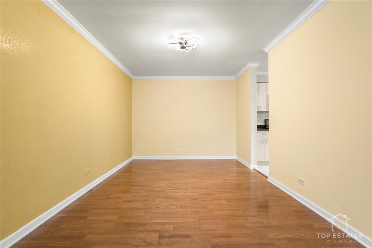 1615 East Central Road, Unit 218C Arlington Heights, IL 60005 - Photo 11 of 33 a view of an empty room