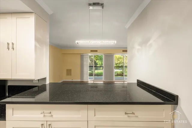a view of wooden floor and living room