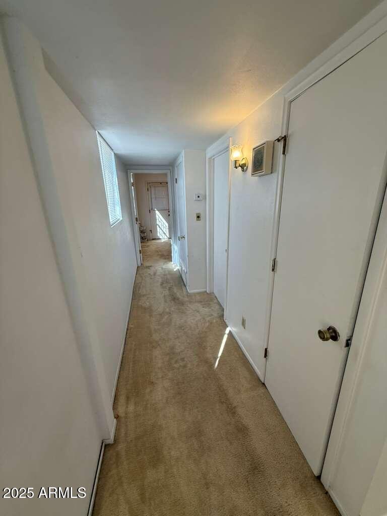 830 East 9th Street, Unit 1 Douglas, AZ 85607 - Photo 11 of 22 a view of a hallway with wooden floor and entryway