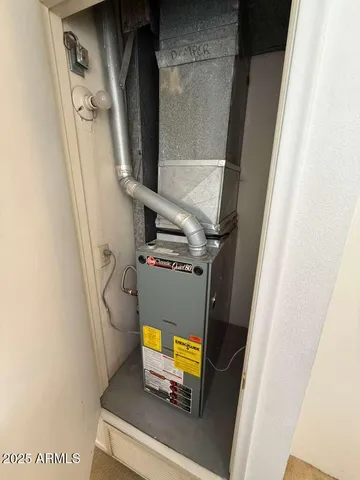 a bathroom with a toilet and bathtub