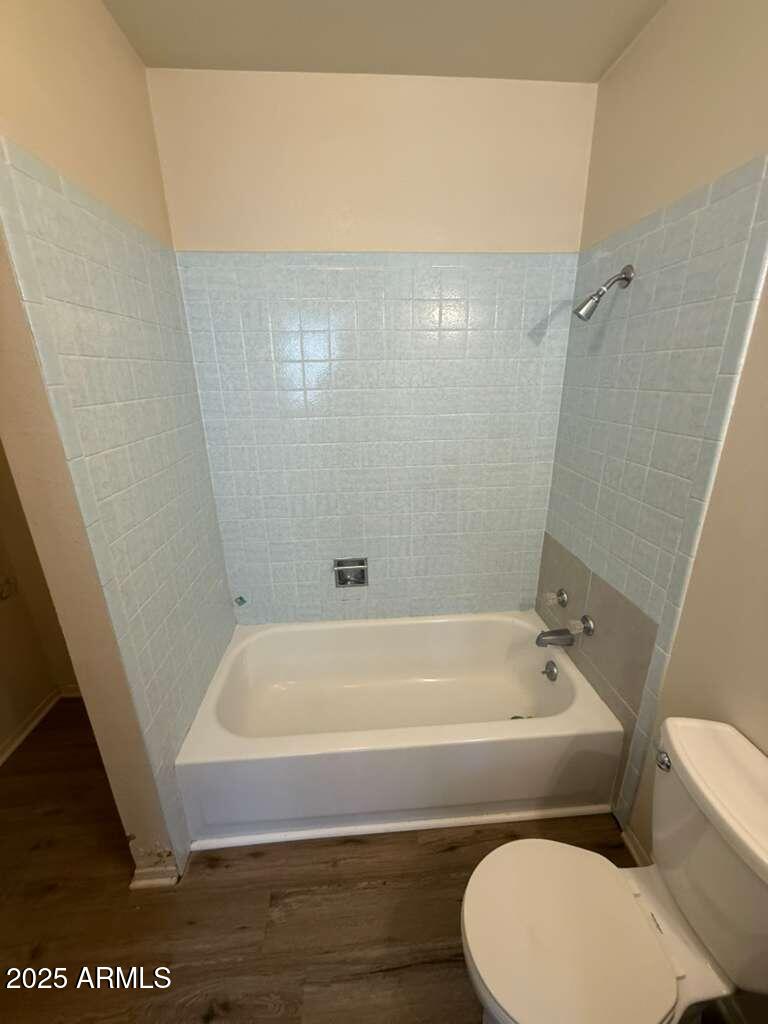 830 East 9th Street, Unit 1 Douglas, AZ 85607 - Photo 15 of 22 a bathroom with a toilet and bathtub