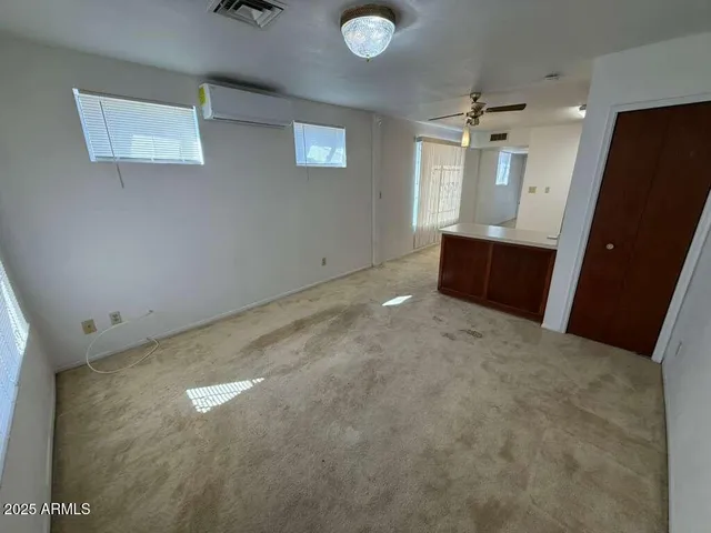 an empty room with windows