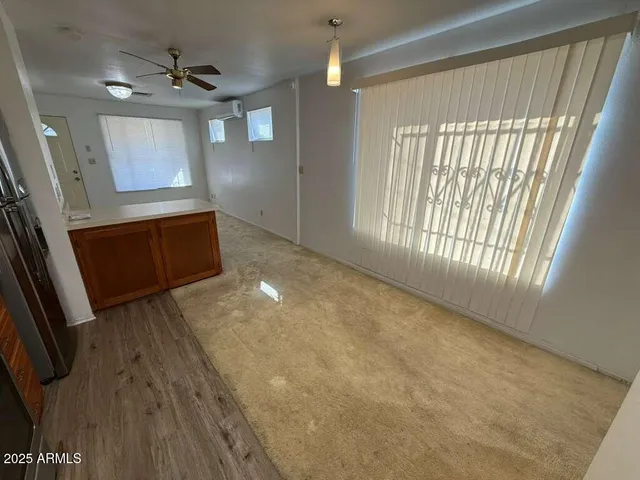 a stove top oven sitting inside of a kitchen