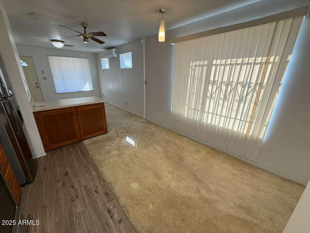 830 East 9th Street, Unit 1 Douglas, AZ 85607 - Photo 8 of 22 a view of an empty room with a window