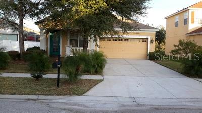 1046 Napolean Way Wesley Chapel, FL 33544 - Photo 1 of 1 a view of a house with a yard