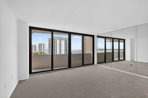 a view of an empty room with sliding door