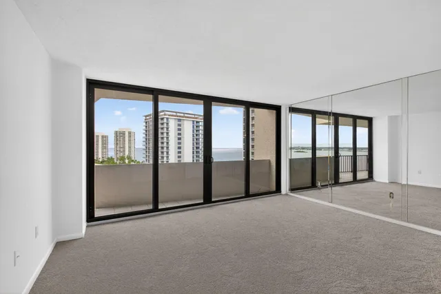 a view of an empty room with sliding door