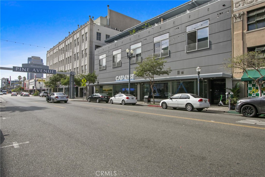 433 Pine Avenue, Unit 203 Long Beach, CA 90802 - Photo 17 of 19 a car parked in front of a building