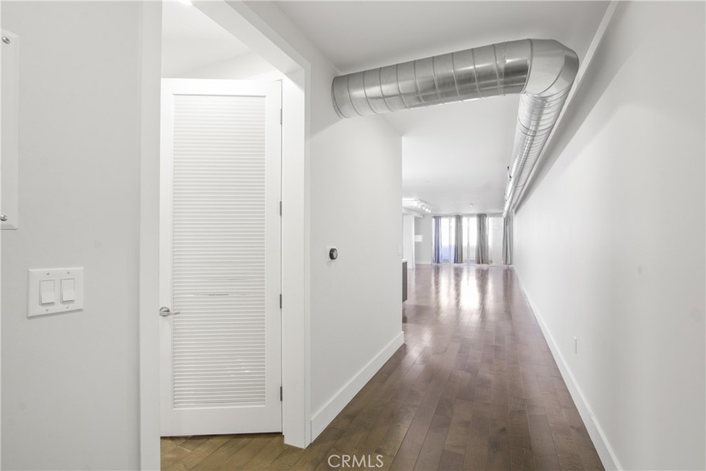 433 Pine Avenue, Unit 203 Long Beach, CA 90802 - Photo 10 of 19 a view of gallery with wooden floor