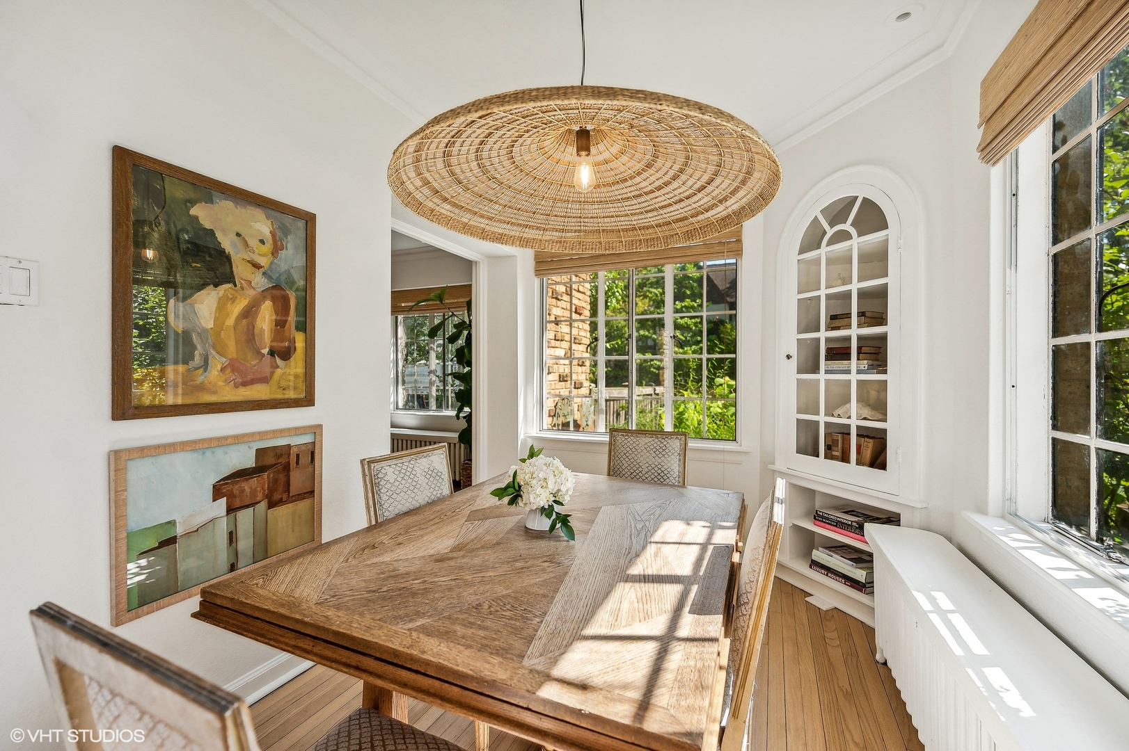 180 Randolph Street Glencoe, IL 60022 - Photo 11 of 36 a view of a dining room with furniture a chandelier and wooden floor