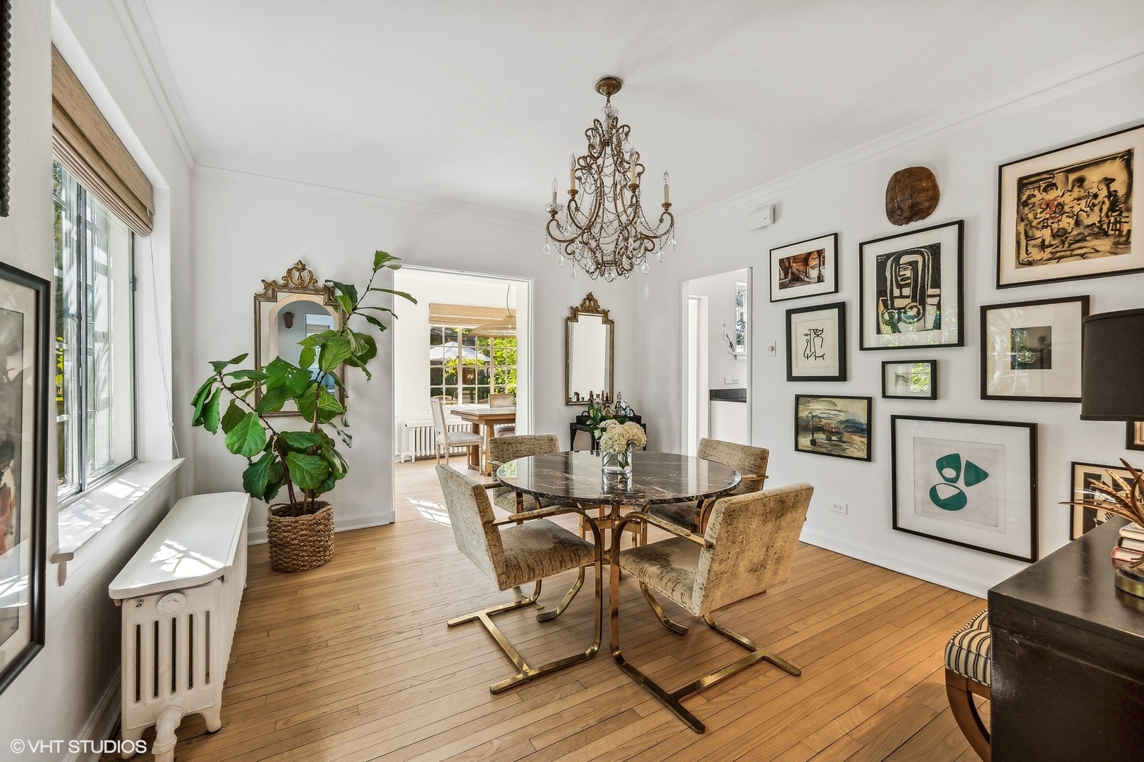 180 Randolph Street Glencoe, IL 60022 - Photo 15 of 36 a view of a dining room with furniture a potted plant and wooden floor