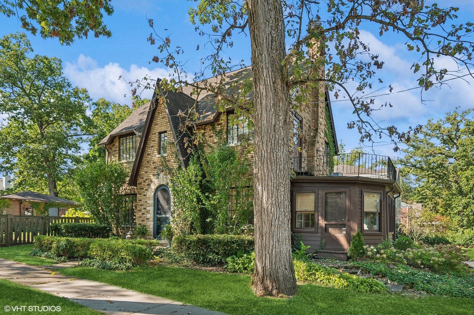 180 Randolph Street Glencoe, IL 60022 - Photo 2 of 36 front view of a house with a tree