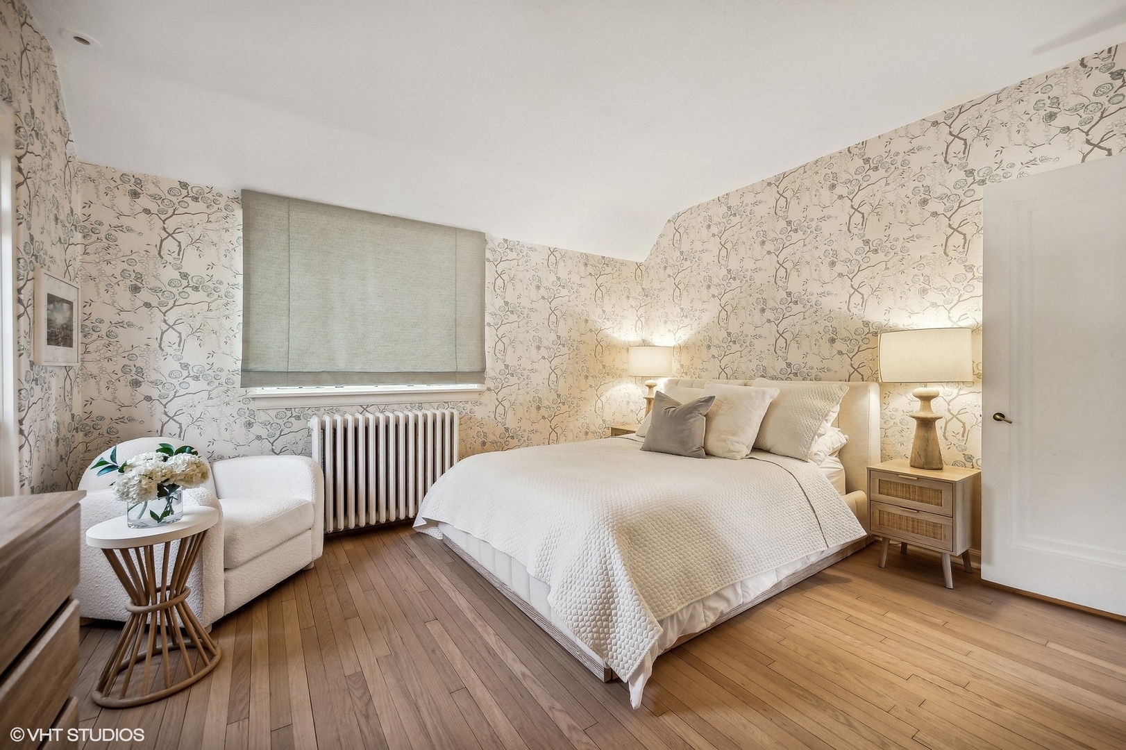 180 Randolph Street Glencoe, IL 60022 - Photo 22 of 36 a bedroom with a bed and wooden floor