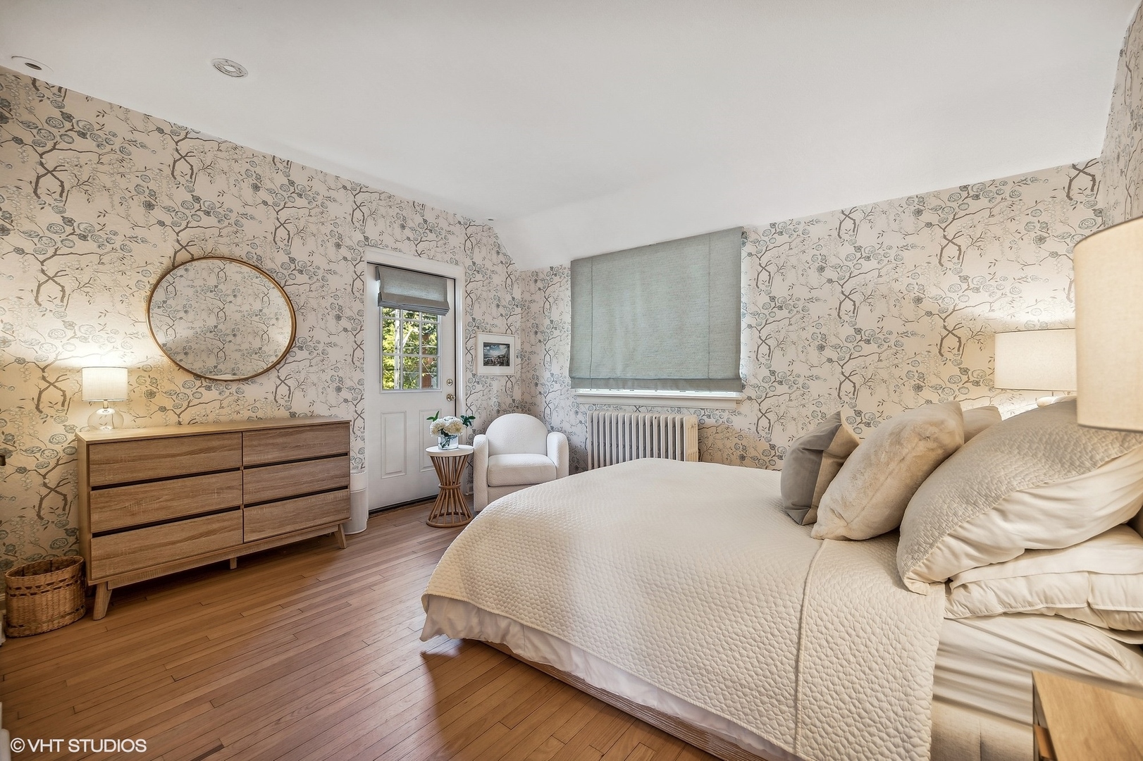 180 Randolph Street Glencoe, IL 60022 - Photo 23 of 36 a bedroom with a bed and a dresser next to a window