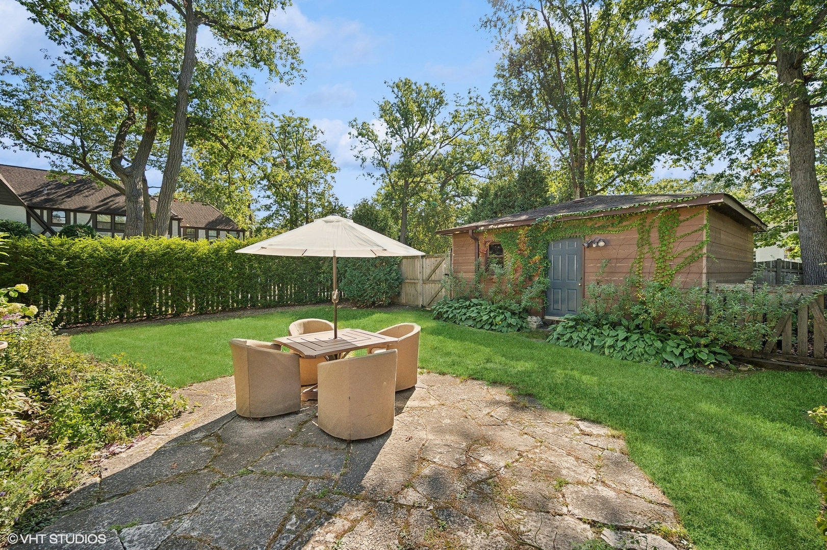 180 Randolph Street Glencoe, IL 60022 - Photo 29 of 36 a house view with a garden space