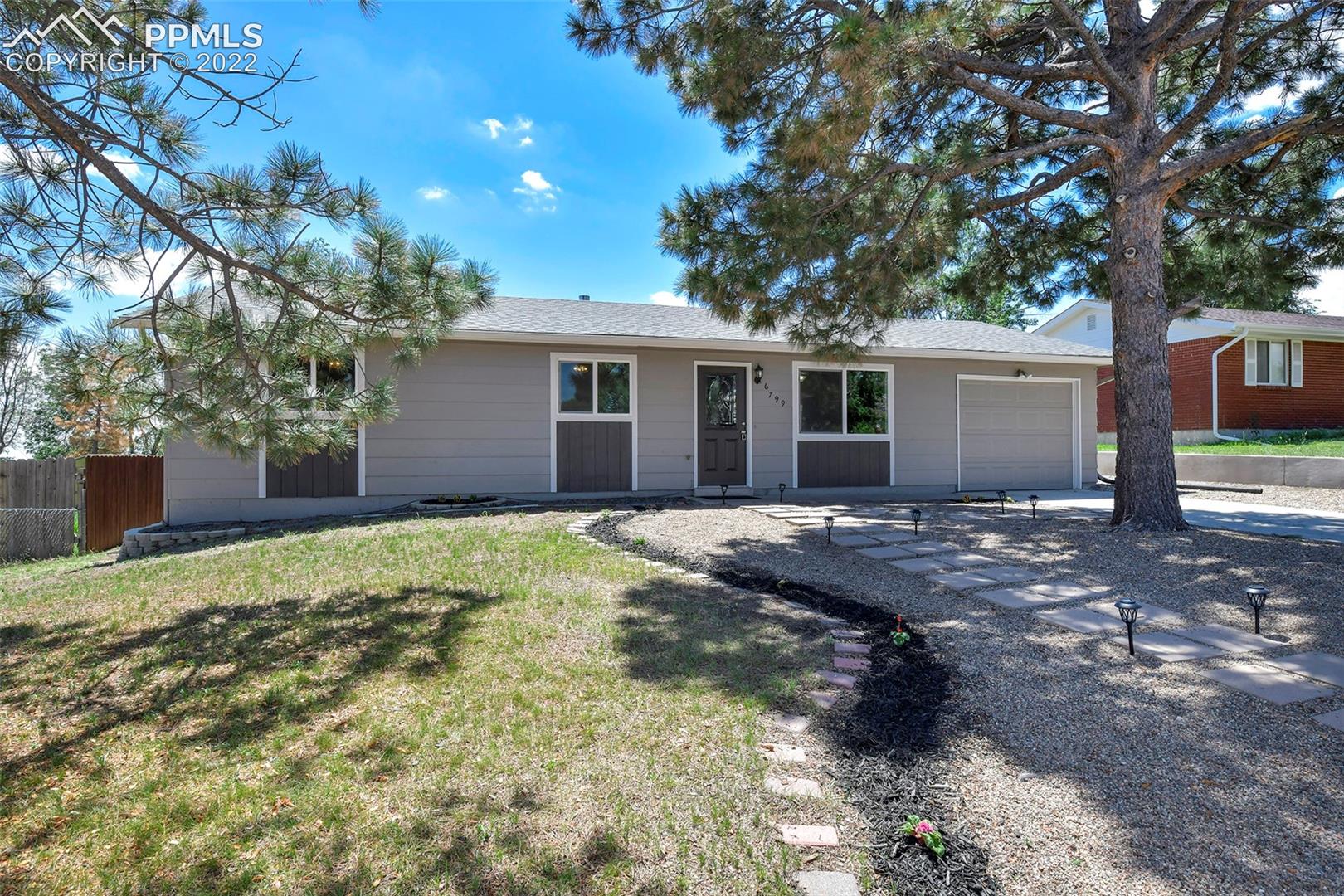 6799 Mission Road Colorado Springs, CO 80915 - Photo 1 of 19 Charming Three Bedroom Rancher with attached garage on a large lot!