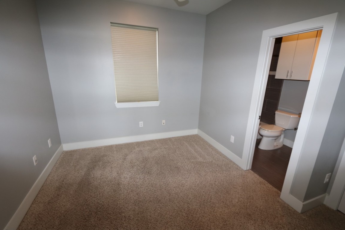 2103 Hadley Street Houston, TX 77003 - Photo 16 of 19 an empty room with a window